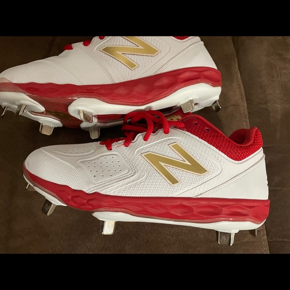 gold new balance softball cleats